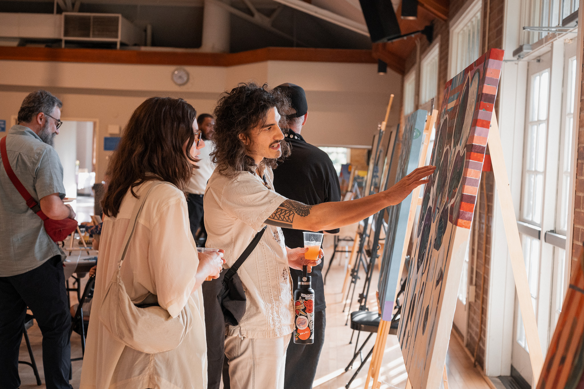 Visitor viewing artwork at gallery